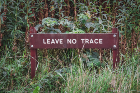 Leave no trace sign out in wildlife/outdoors. For the purpose of arguing the 7 principles about leaving no trace and environmental impacts