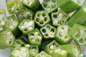 Okra, cut into pieces. Okra can potentially reduce microplastics in water. Eco innovation at This Kind Planet